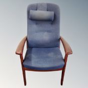 A pair of continental armchairs in blue upholstery
