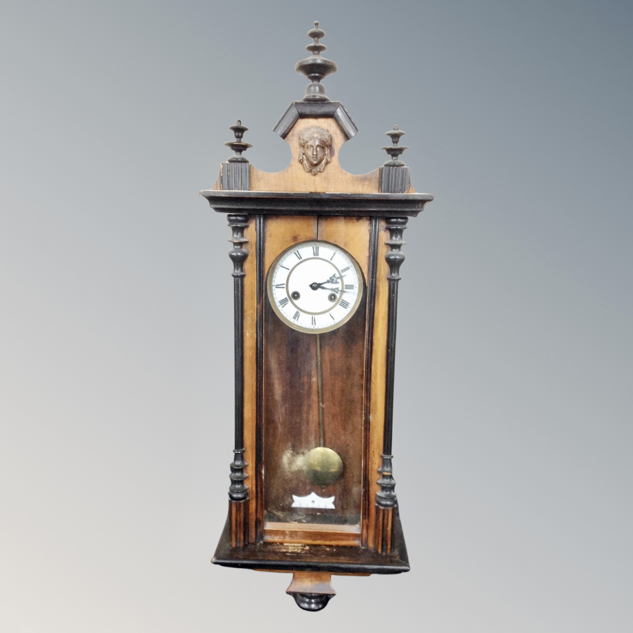 An antique mahogany and beech cased 8 day wall clock.