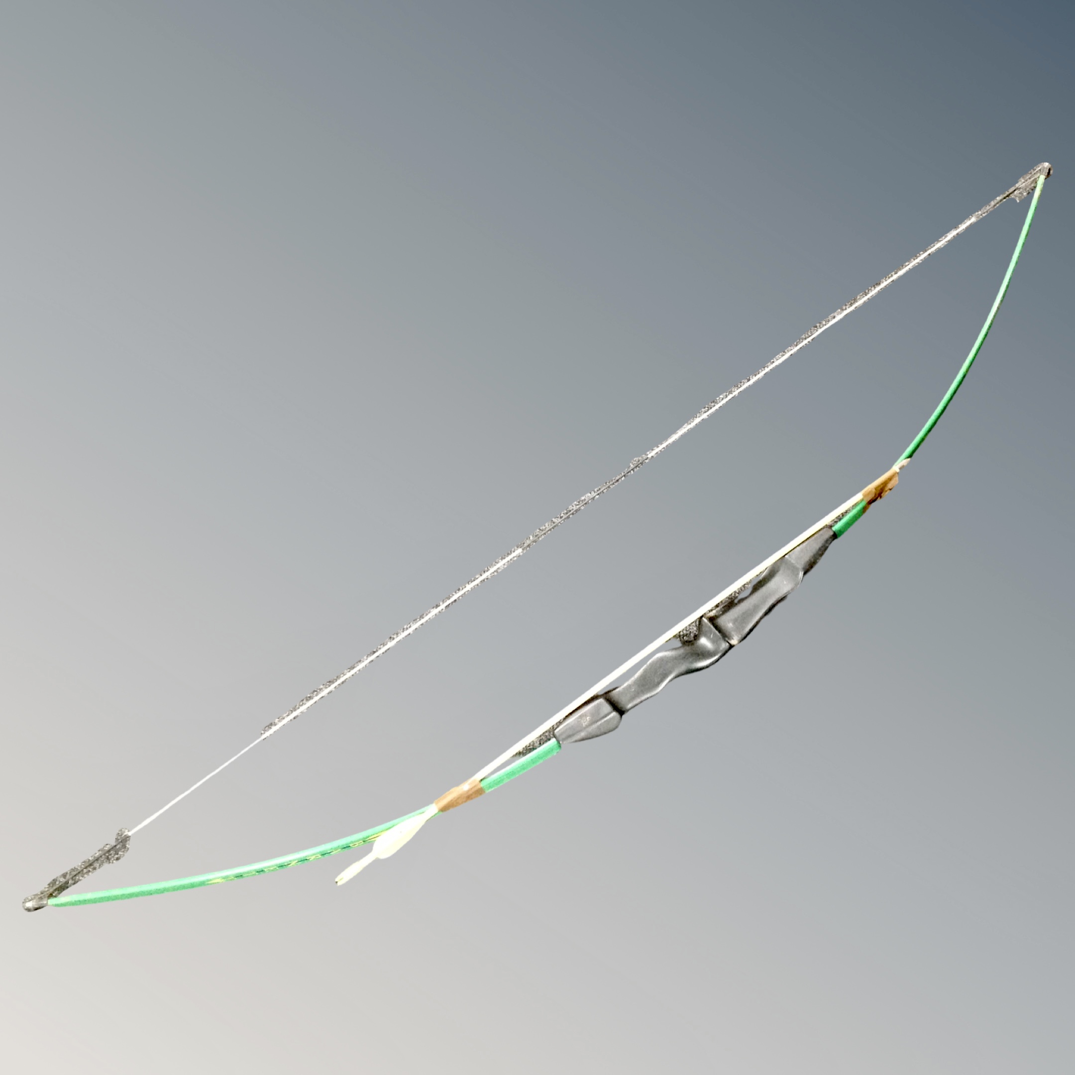 Barnett archery long bow with arrow.