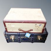 A vintage wooden bound travelling trunk together with a further vintage suitcase.