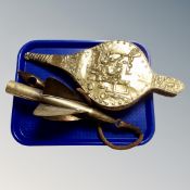 A set of antique brass embossed bellows together with a ship's taffrail log.