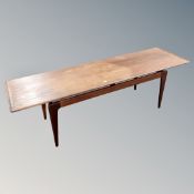 A mid century Afromosia teak coffee table by John Herbert for Younger circa 1950's.