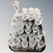 A tray of crystal, cut glass decanter etc.