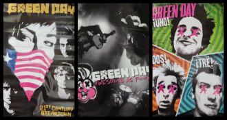 A collection of Green Day rock band posters.