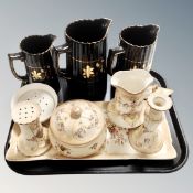 A tray containing a set of three 19th century graduated jugs together with a Crown Devon Fieldings