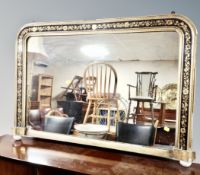 A Victorian black and gilt overmantel mirror