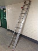 An aluminium twin section extension ladder