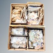 Two boxes of thousands of stamps, mainly 20th century world stamps,