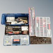 A plastic toolbox together with a further plastic storage caddy containing tools and accessories,