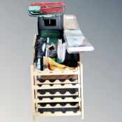 A wine rack together with a qualcast electric lawnmower, miniature work bench, garden netting,