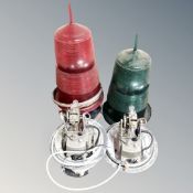 Two electric nautical stone chance navigation aids with plastic coloured lenses