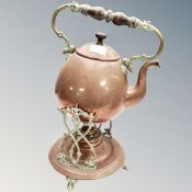 A copper and brass spirit kettle