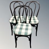 A set of three painted bentwood dining chairs