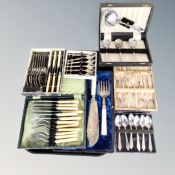 A tray of several cases of epns and stainless steel cutlery,