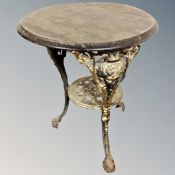 A cast iron Brittania bar table with circular top