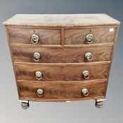 A Victorian mahogany bow fronted five drawer chest with brass handles