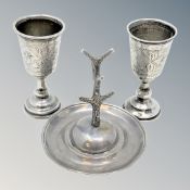 A pair of Edwardian silver goblets and an antique silver ring tree (3) CONDITION REPORT: