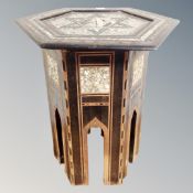 An antique Indian hexagonal mother of pearl occasional table