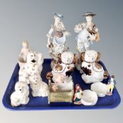 A tray of continental figures, Staffordshire dogs,