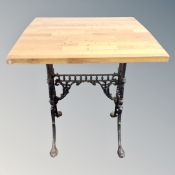 A square topped bar table on vintage cast iron legs (a/f)