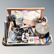 A box containing vintage candlestick telephone, cameras, oil can,