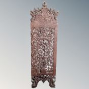 An Asian carved hardwood frieze panel.