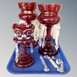Three 19th century ruby glass lustres with crystal drops