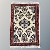 A small Iranian hearth rug 97 cm x 61 cm