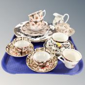 A tray containing a pair of Royal Crown Derby Imari china teacups and saucers together with further