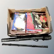 A box containing a large quantity of music books together with a flute in case.