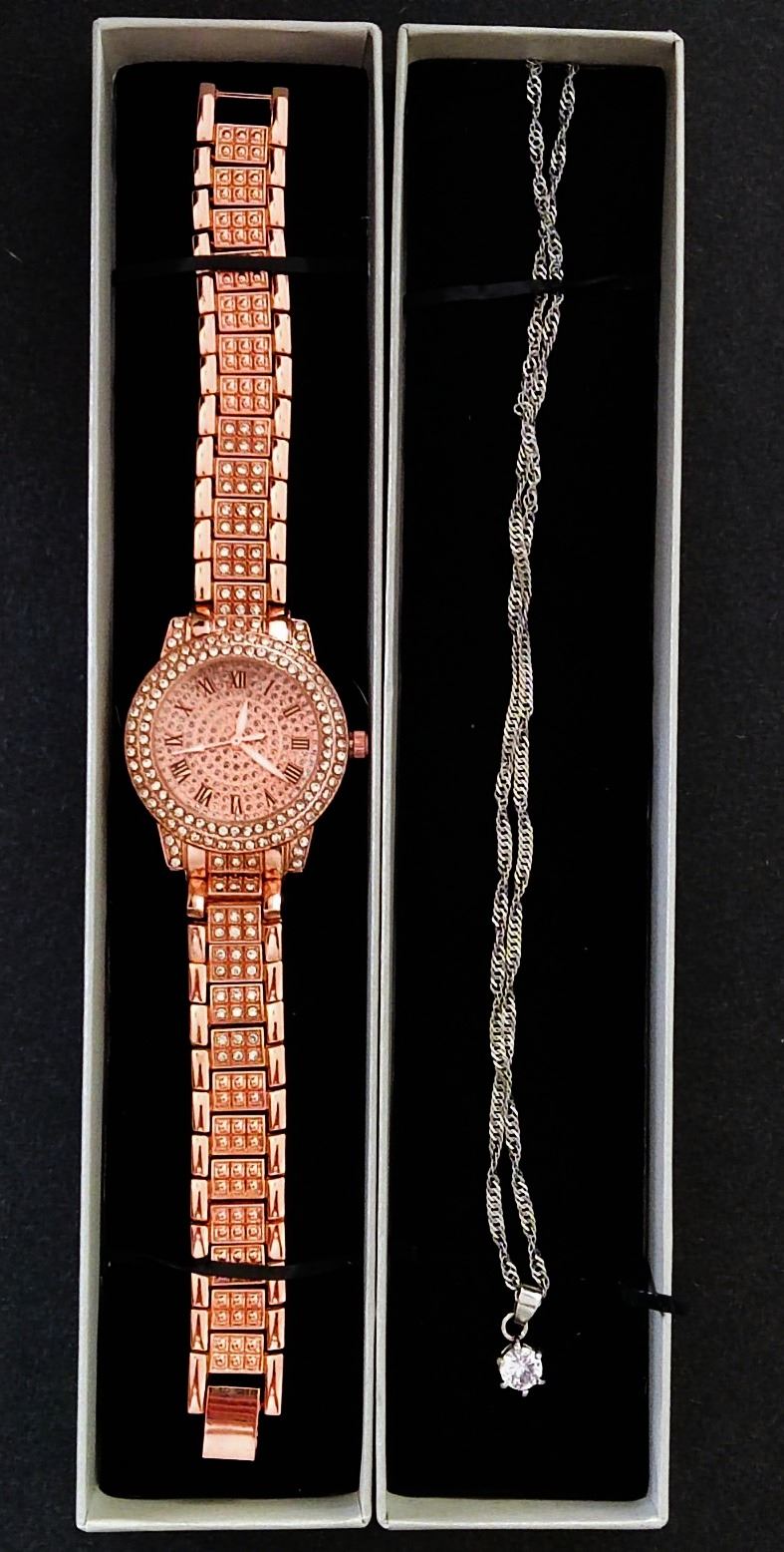 A rose diamante watch,