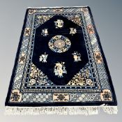 A Chinese rug on blue ground 213 cm x 141 cm