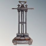A 19th century cast iron stick stand with lift out tray