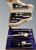 Two cased manicure sets, one in the form of a grand piano.