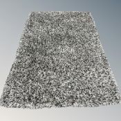 A contemporary shaggy pile rug 247 cm x 174 cm