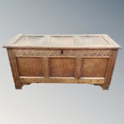 A George III panelled oak coffer