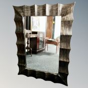 A painted composite framed overmantel mirror.