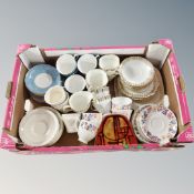 A crate of part English china tea services,
