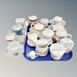 A tray of shaving mugs