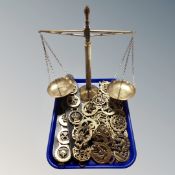A set of vintage brass pan balance scales together with a large quantity of horses brasses,