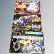 Two boxed Scalextric racing sets together with a further Marks and Spencers Italian job racing set