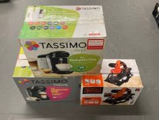 Two Tassimo coffee makers, together with