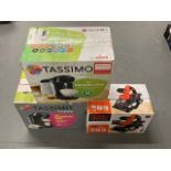 Two Tassimo coffee makers, together with