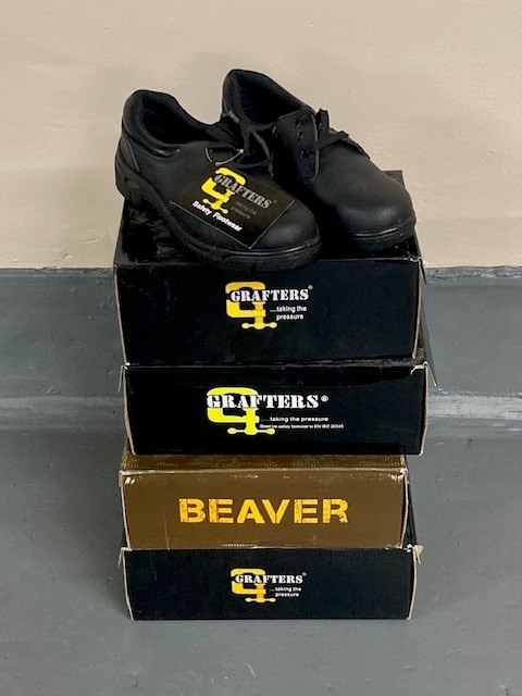 Three pairs of Grafter safety shoes and