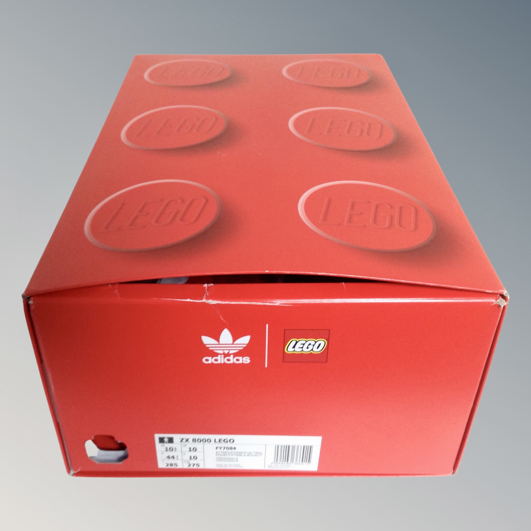 A pair of Adidas ZX8000 lego original trainers, red, size 10, as new in box. - Image 2 of 2