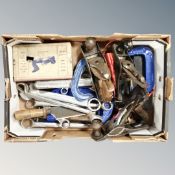 A box containing assorted hand tools to include Stanley woodworking planes, ring spanners,