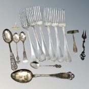 A quantity of cutlery including heavy forks, all items stamped 84. 830 835 and 800.