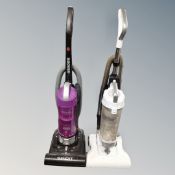 A Hoover Spirit upright vacuum together with a further Bush upright vacuum.