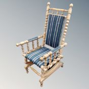 A vintage bobbin-turned rocking chair.