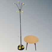 A 1970s hat and coat stand together with a circular occasional table,